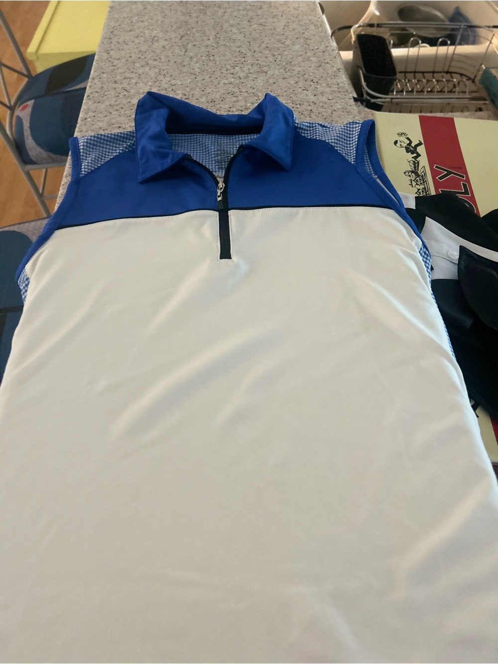 Izod Blue and White Sleeveless Zip Golf Shirt
